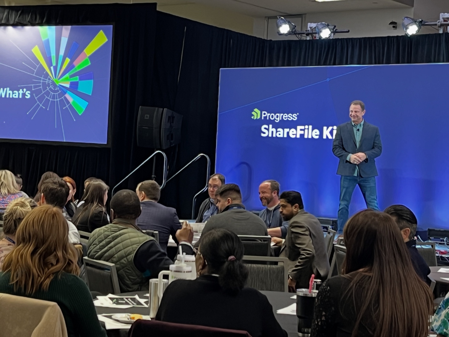 Tim presenting at ShareFile kickoff on stage